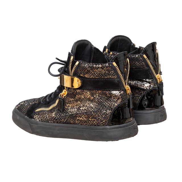 VINTAGE, RRP AS NEW
Elevate your sneaker game with Giuseppe Zanotti's Printed Snakeskin Sneakers. The high-top design features a unique snakeskin print on the signature Coby model, with a velvet and leather construction. Complete with a double gold metal strap and 'Signature' detail for added style. 
Remarks: there are some signs of wear. Measurments:  length: 746 mm