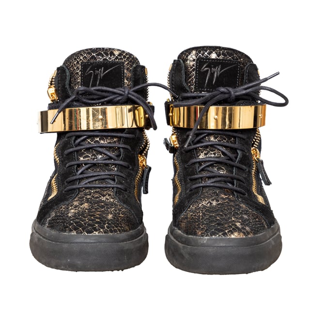 VINTAGE, RRP AS NEW
Elevate your sneaker game with Giuseppe Zanotti's Printed Snakeskin Sneakers. The high-top design features a unique snakeskin print on the signature Coby model, with a velvet and leather construction. Complete with a double gold metal strap and 'Signature' detail for added style. 
Remarks: there are some signs of wear. Measurments:  length: 746 mm
