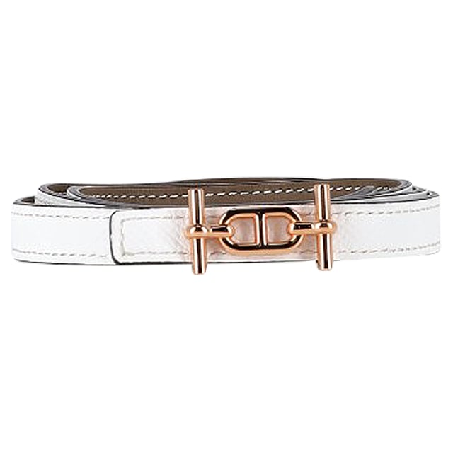 VINTAGE, RRP AS NEW
The Hermès Reversible Ancre Belt Kit in White Leather with Gold-Tone Hardware is a versatile and luxurious accessory. Featuring Epsom leather trim and a reversible design, this belt offers flexibility in styling options. The peg-in-hole closure ensures a secure and adjustable fit. With its timeless design and high-quality craftsmanship, this Hermès belt kit is a sophisticated addition to any wardrobe, adding a touch of elegance to a variety of outfits.

Hermès Reversible Ancre Belt Kit in White Leather
Condition: Excellent
Signs of wear:  No sign of wear.
Packaging: None
Color: White 
Material: Leather 
Size: One Size | One Size
Measurements: Width: 900; Length: 15
SKU: NAPPUGBAC420808W
