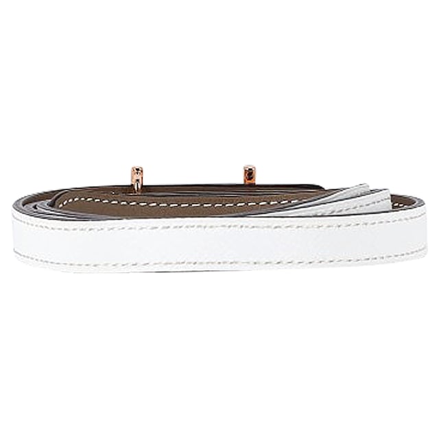 VINTAGE, RRP AS NEW
The Hermès Reversible Ancre Belt Kit in White Leather with Gold-Tone Hardware is a versatile and luxurious accessory. Featuring Epsom leather trim and a reversible design, this belt offers flexibility in styling options. The peg-in-hole closure ensures a secure and adjustable fit. With its timeless design and high-quality craftsmanship, this Hermès belt kit is a sophisticated addition to any wardrobe, adding a touch of elegance to a variety of outfits.

Hermès Reversible Ancre Belt Kit in White Leather
Condition: Excellent
Signs of wear:  No sign of wear.
Packaging: None
Color: White 
Material: Leather 
Size: One Size | One Size
Measurements: Width: 900; Length: 15
SKU: NAPPUGBAC420808W