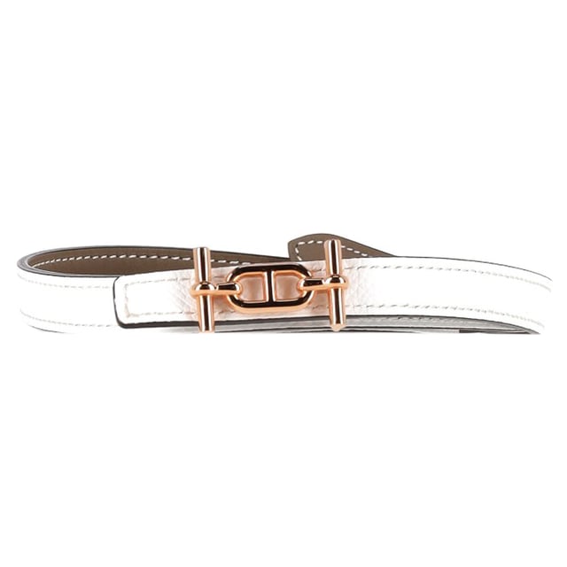 VINTAGE, RRP AS NEW
The Hermès Reversible Ancre Belt Kit in White Leather with Gold-Tone Hardware is a versatile and luxurious accessory. Featuring Epsom leather trim and a reversible design, this belt offers flexibility in styling options. The peg-in-hole closure ensures a secure and adjustable fit. With its timeless design and high-quality craftsmanship, this Hermès belt kit is a sophisticated addition to any wardrobe, adding a touch of elegance to a variety of outfits.

Hermès Reversible Ancre Belt Kit in White Leather
Condition: Excellent
Signs of wear:  No sign of wear.
Packaging: None
Color: White 
Material: Leather 
Size: One Size | One Size
Measurements: Width: 900; Length: 15
SKU: NAPPUGBAC420808W