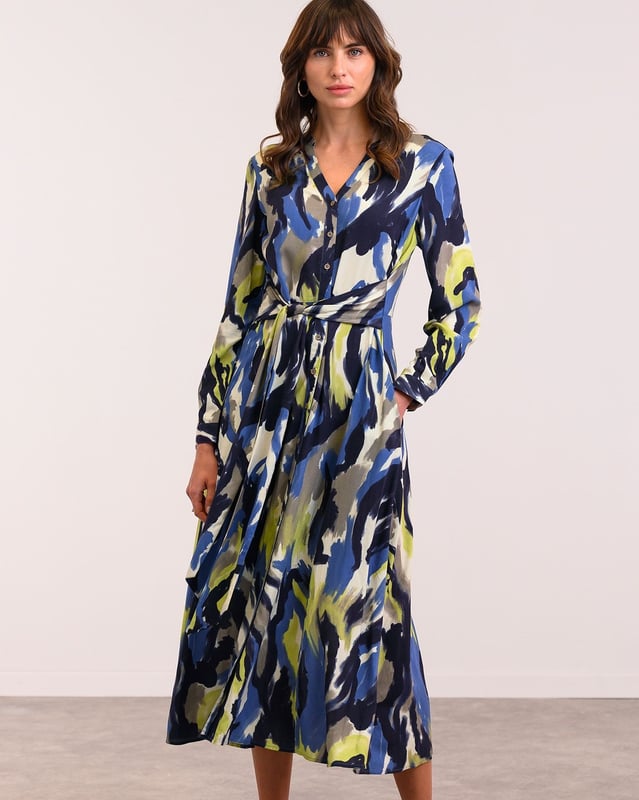 Made from a light and airy fabric that drapes beautifully, this button through midi dress has a full, flowing skirt. It can be tied at the front or back, and features a v-neckline with stand collar detailing, and long sleeves with cuff and button fastenings.100% Viscose.  Made in China.