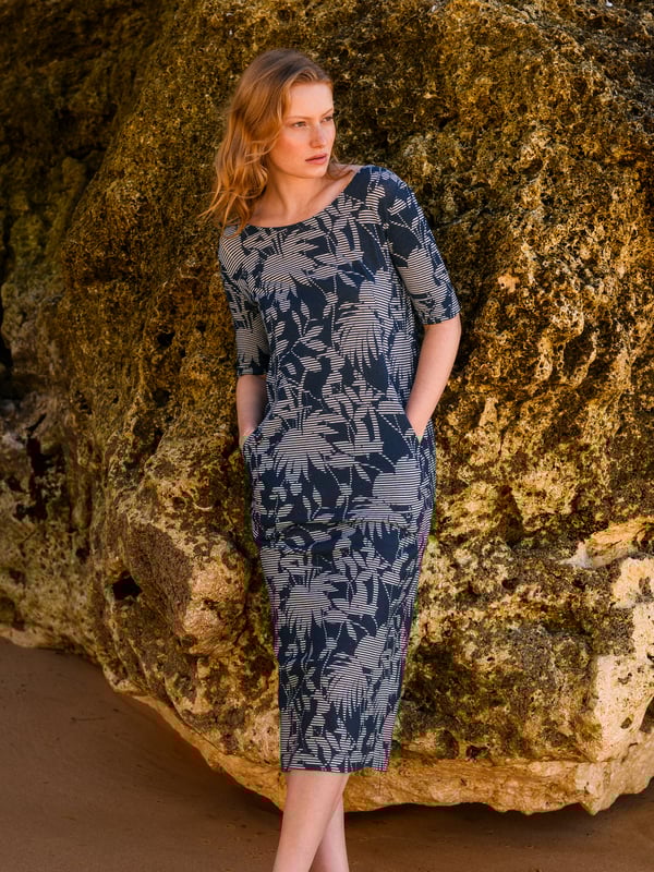 Designed to slip on effortlessly with a flattering fit that feels custom made, this short-sleeved dress is crafted in linen blended with cotton for an airy, lightweight feel that's perfect on warmer days.Complete with side pockets and a wide, scooped neckline, it features buttons through the upper back and a slit at the rear hem. Style it with casual high-top trainers and a denim jacket for a laid-back look you'll love.