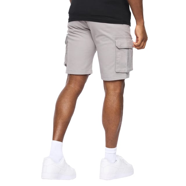 98% Cotton, 2% Elastane. Fabric: Canvas, Stretch. Design: Plain. Pockets: 2 Side Pockets, 2 Thigh Pockets, 2 Back Pockets, Flap Closure. Fastening: Button, Zip Fly. Fabric Technology: Durable, Flexible. Belt Loops, Leather Patch.