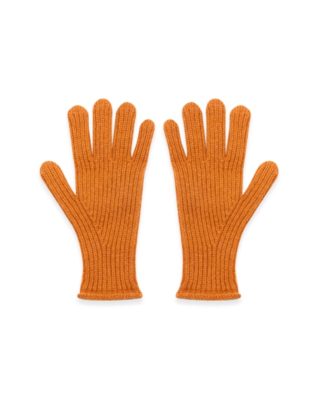 Experience ultimate comfort with these Lambswool gloves. Their unique ribbed design ensures a snug fit, which contours with your hands. Made from Lambswool for a soft and luxurious feel, made in Britain.