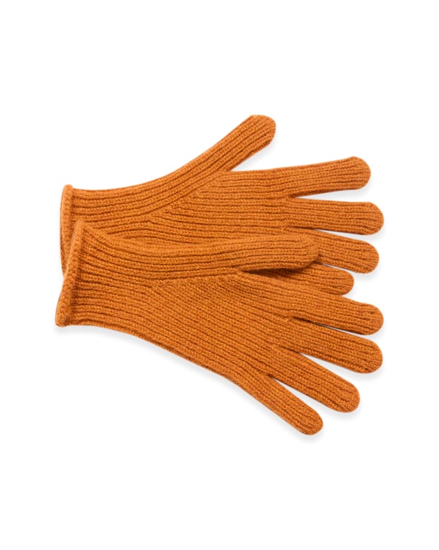Experience ultimate comfort with these Lambswool gloves. Their unique ribbed design ensures a snug fit, which contours with your hands. Made from Lambswool for a soft and luxurious feel, made in Britain.