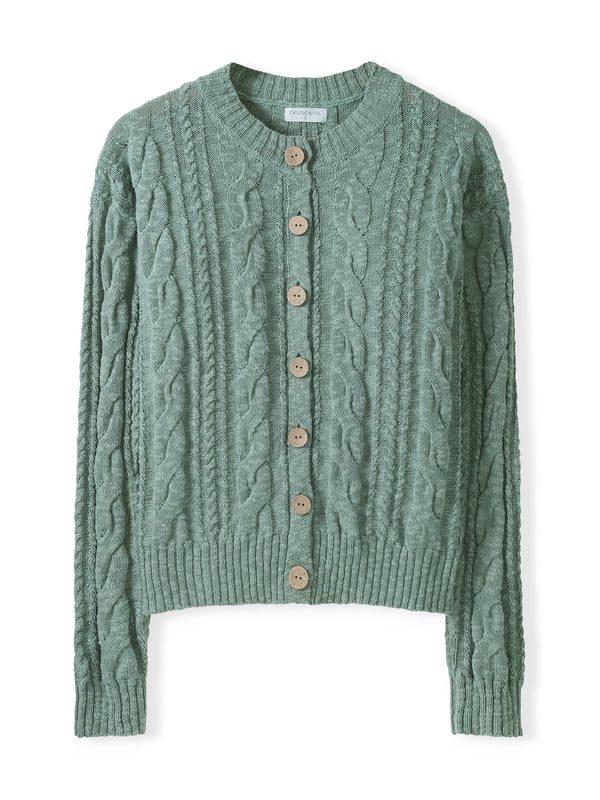This cardigan has a classic cable-knit pattern with a relaxed, drop-shoulder shape, finished with natural coconut buttons. The cotton-linen blend lends an airy feel, while the crew neckline and boxy fit create an easy, everyday layer.