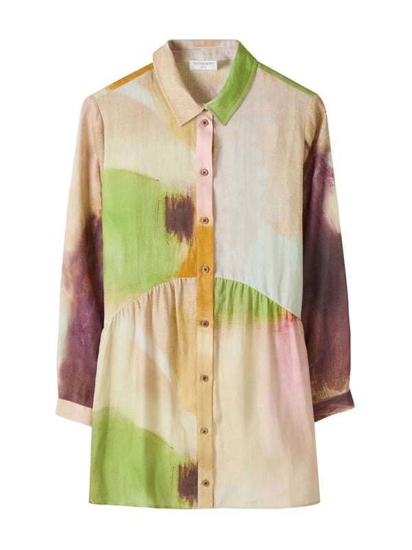 Linen Gathered Waist Tunic This tunic-length shirt is made from garment-dyed and washed linen, offering a softer, tumbled look. The fit is more oversized, with a curved seam running from the front to the back, creating a fuller gathered peplum around the lower part of the garment. The shirt collar, full-length button-through placket, and full-length shirt sleeves with buttons made from Corozo nut complete the design.