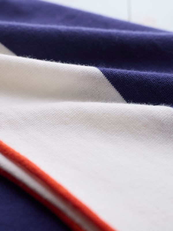 With an elegant boat neckline and neat cut, classic look, this jumper is ideal for everyday wear. Made in Ultrafine Merino wool which helps keep the creases at bay, promote breathability in warmer conditions and generate natural warmth if it's chilly, this jumper provides versatile appeal for all seasons. With an elegant drape, this is perfect for layering over a shirt collar or can be simply styles on it's own as the soft yarns will feel beautifully gentle against your skin.
