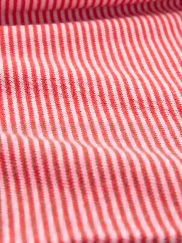With an elegant boat neckline and neat cut, classic look, this jumper is ideal for everyday wear. Made in Ultrafine Merino wool which helps keep the creases at bay, promote breathability in warmer conditions and generate natural warmth if it's chilly, this jumper provides versatile appeal for all seasons. With an elegant drape, this is perfect for layering over a shirt collar or can be simply styles on it's own as the soft yarns will feel beautifully gentle against your skin.
