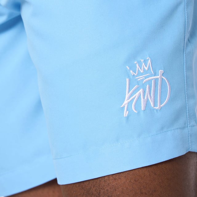Mens Kings Will Dream Crosby 2.0 Swim Shorts in sky blue- Elasticated waist with drawcord- Side welt pockets- Rear patch pocket- Inner mesh brief- Embroidered logo at left hem- Relaxed fit- Shell: 100% Polyester.  Lining: 100% Polyester mesh.  Machine washable- Ref: KD2R124389ASSTK1