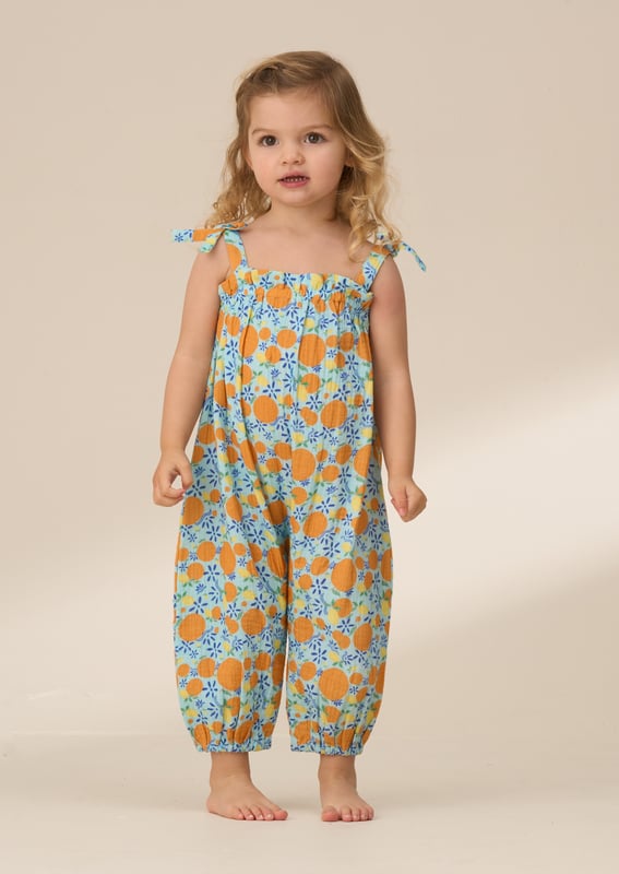 This scrumptious fruit print romper is crafted from soft double cloth cotton. providing both comfort and style. Soft. breathable. and perfect for summer days. it’s the ideal piece for little ones—and pairs perfectly with our big sister dress!.