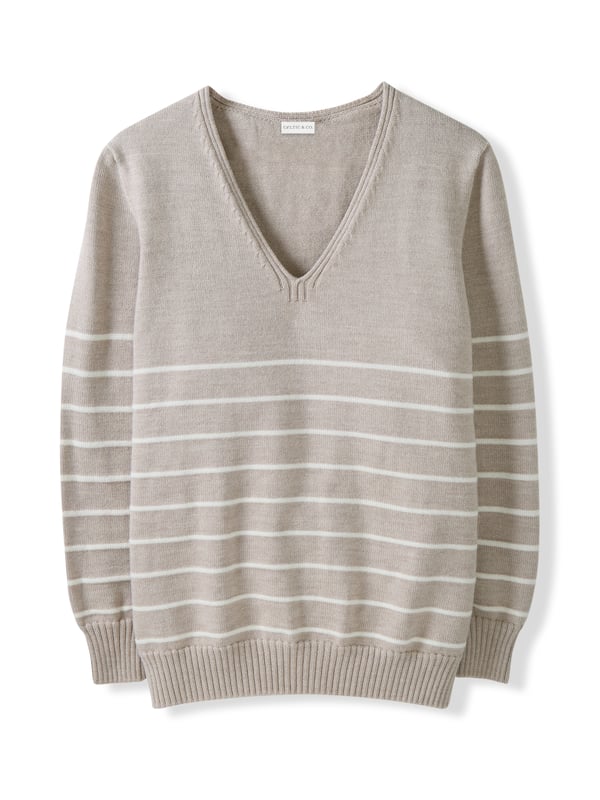 Our Merino V Neck Jumper has been seamlessly knitted in Britain with full-length sleeves and a ribbed hem and cuffs. The clean, luxury handle of the merino wool offers warmth to a traditional v-neck style in a contemporary breton stripe design. Whether you're layering up for the evening or keeping it casual, this jumper is a versatile choice for any occasion.