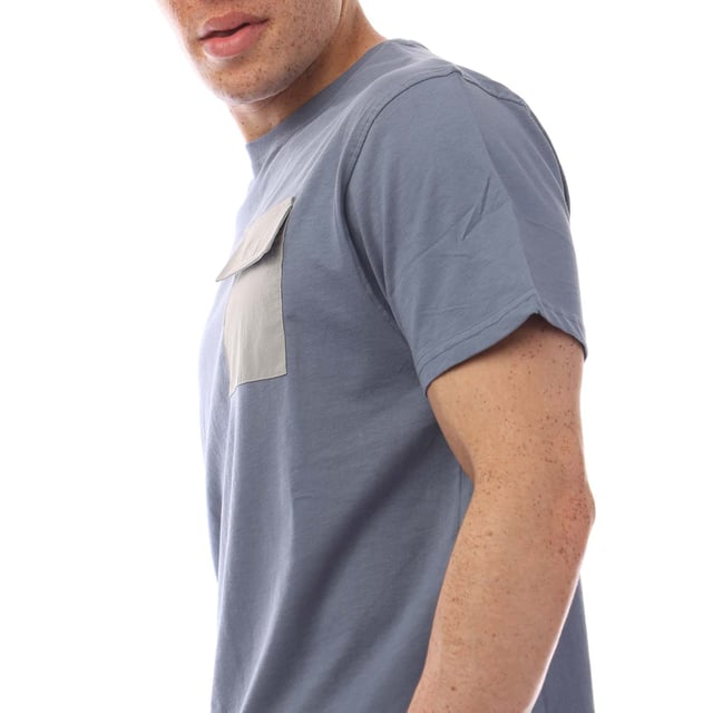 Introducing the Limatar Tee  a 100% Cotton crew neck t-shirt with a regular fit for comfort and a modern look. The contrast polyester chest pocket with a Velcro flap adds both style and function. Perfect for everyday wear  this tee pairs easily with denim jeans.