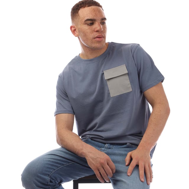 Introducing the Limatar Tee  a 100% Cotton crew neck t-shirt with a regular fit for comfort and a modern look. The contrast polyester chest pocket with a Velcro flap adds both style and function. Perfect for everyday wear  this tee pairs easily with denim jeans.
