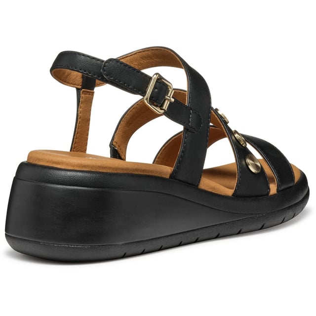 Meliconia ist eine stadtgeeignete Keilsandalette mit einem zeitgemäßen Design, die sowohl Komfort als auch Atmungsaktivität bietet. Leicht und mit einem einfachen Einstieg, besteht sie aus einem lederähnlichen Material und ist die ideale Lösung für warme Tage.
