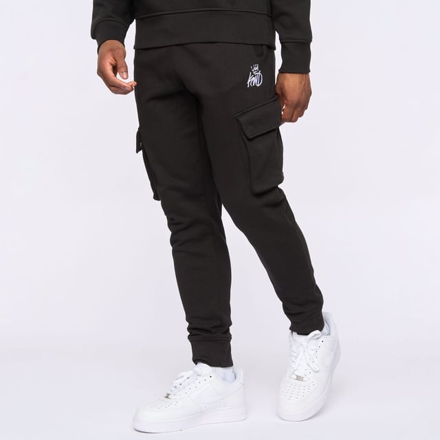 Mens Kings Will Dream Crosby 2.0 Cargo Joggers in black- Elasticated waist with drawcord- Multi-pocket design- Embroidered logo at left thigh- Ribbed cuffs- Soft brushback fleece construction- Tapered fit- 60% Cotton  40% Polyester.  Machine washable.- Ref: KD2U124382ASSTK2