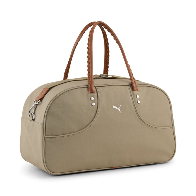 PUMA Unisex 1976 MMQ Grip Bag PRODUCT STORY: Step up your game with this PUMA masterpiece. Featuring roped carry handles, metal zip pullers, and an embroidered PUMA Cat logo, this bag combines minimalistic aesthetics with sophisticated details. Perfect for those who appreciate quality and contemporary design. FEATURES & BENEFITS: Made with at least 50% recycled materials. DETAILS: Two-way metal zip opening with twin stitch detail; Roped carry handles with braiding detail; Authentic piped construction; Sophisticated details; Dimensions: W50cm / D22cm / H29cm; Volume: 30L; PUMA branding details.