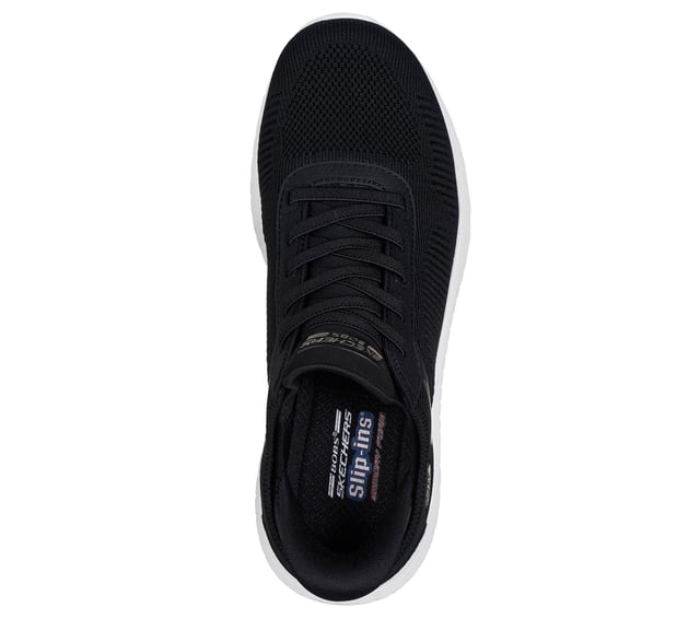 Skechers Hands Free Slip-ins®. This eco-friendly, vegan athletic sneaker is crafted with recycled materials and features a breathable stretch knit upper with fixed stretch laces for easy slip-on wear. Designed for all-day support, it includes a well-cushioned midsole and a Skechers Air-Cooled Memory Foam® insole for superior comfort and airflow. Perfect for walking, travel, and everyday wear.