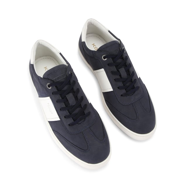 KG Kurt Geiger Spark Sneakers This KG Kurt Geiger pair of Spark sneakers arrive in a navy Nubuck leather with two white stripes either side. The front laces up and there is embossed branding on the heel.
