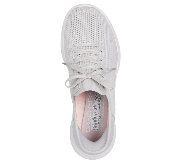 Step into comfort with Skechers Hands Free Slip-ins®. This easy-on style features a Stretch Fit® engineered knit upper with decorative laces for a sock-like fit and modern look. Designed with Skechers’ exclusive Heel Pillow™ for added heel support and stability, it also includes a cushioned Skechers Air-Cooled Memory Foam® insole for breathable, all-day comfort. These vegan slip-on sneakers combine convenience, style, and performance.