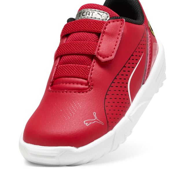 PRODUCT STORY: Unleash your inner speedster with PUMA's Ferrari collaboration. Sleek synthetic upper, rubber sole, and Ferrari's iconic colours make every step a statement. Perfect for those who live life in the fast lane and love to stand out. FEATURES & BENEFITS: The upper of the shoes is made with at least 20% recycled materials. DETAILS: Regular width; Synthetic upper; Elasticated closure for quick on-and-off; Rubber outsole; Iconic Scuderia Ferrari colours; PUMA Toddlers: Recommended for toddlers between 0 and 4 years.