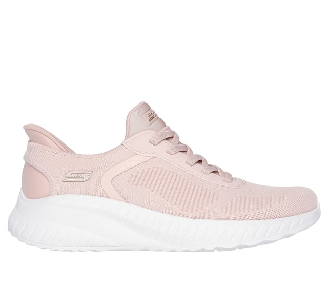 Step into effortless style with Skechers Hands Free Slip-ins®. This fashionable slip-on sneaker features an engineered knit upper with stretch laces for a secure, sock-like fit. Designed with Skechers’ exclusive Heel Pillow™ for added heel support and stability, it also includes a cushioned Skechers Memory Foam™ insole for long-lasting comfort. Perfect for everyday wear, walking, or travel, this easy-on style blends modern design wth all day support.