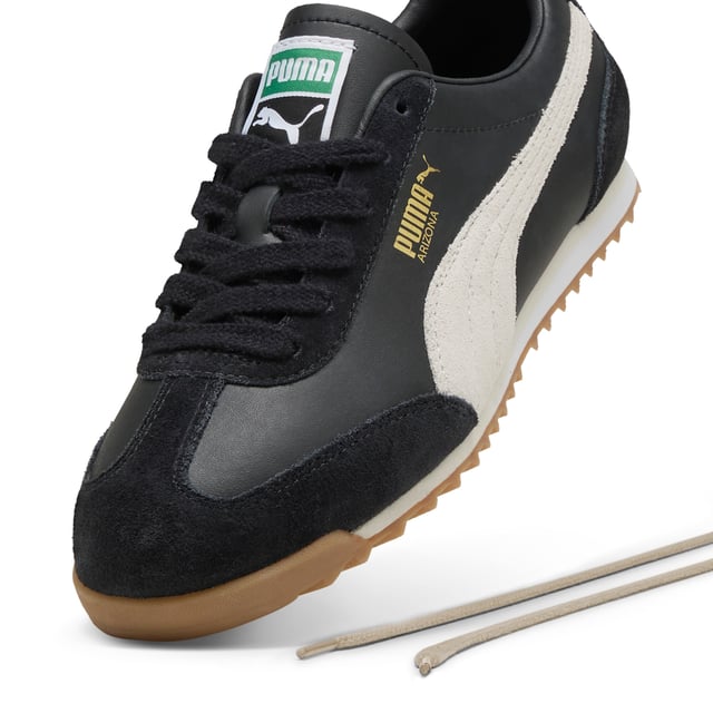 PRODUCT STORY: Straight from our 1970s archive, the Arizona was a low-slung training shoe used for a variety of sports. Now it's back with its classic look and timeless appeal. This version features the Arizona's signature short toe box alongside suede overlays and a leather base. The plush EVA midsole deliver comfort and cred with every laid-back step. DETAILS: Textile upper; Suede overlay; Textile insole; EVA midsole; Rubber outsole; PUMA branding details.
