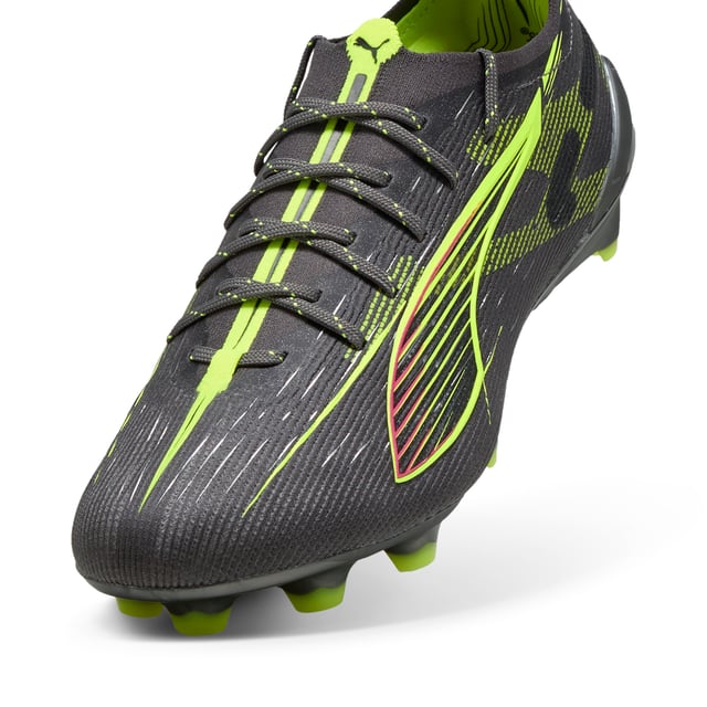 PRODUCT STORY: How fast is the ULTRA 5 ULTIMATE? Fasten your seatbelt, fasten your laces and unleash your speed. PUMA's latest innovation combines the SPEEDSYSTEM outsole and FastTrax studs for explosive acceleration. With GripControl Pro skin and PWRTAPE SQD support, dominate the field with unmatched agility and precision. Play at full throttle. FEATURES & BENEFITS: Made with at least 50% recycled materials; ACCELERATION: PUMA's SPEEDSYSTEM CARBON outsole combines springy carbon-fiber material for rapid propulsion with an innovative stud placement and orientation for faster acceleration.; TRACTION: PUMA's proprietary FastTrax studs are complemented with more rounded studs on lateral side for the most optimal traction on both firm ground and artificial grass.; STABILITY: PWRTAPE support frame stabilizes the foot inside of the boot to enable rapid changes of direction.. DETAILS: Lightweight removable sockliner with NanoGrip and Ortholite cushioning for exceptional fit and comfort; SPEEDSYSTEM outsole and FastTrax stud design deliver maximum acceleration and traction; PWRTAPE SQD support frame provides stability without compromising agility; Regular to narrow fit; FG: Suitable for use on firm natural surfaces.