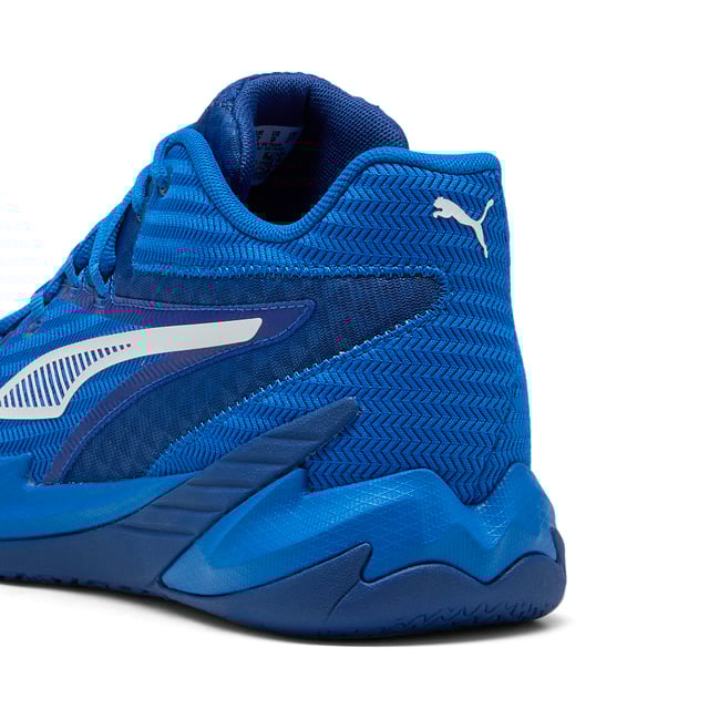 PRODUCT STORY: Stand out with fast, progressive design. Our latest innovation features a PROFOAM midsole for lightweight rebound, PUMA BITE outsole for traction, and dynamic lacing for a secure fit. Perfect for dominating outdoor courts with confidence and style. Get ready to win. FEATURES & BENEFITS: The upper of the shoes is made with at least 20% recycled materials; PUMA BITE: Durable outsole pattern that offers superior traction on the court; PROFOAM: Lightweight EVA designed to cushion your landing and propel your next step. DETAILS: Regular width; Dynamic lacing system with anchor points on the vamp and through the forefoot, for a more secure, sure-footed feel; External rubber wrap-up for lateral stability; PUMA Hoops Jaws branding; PUMA branding details.