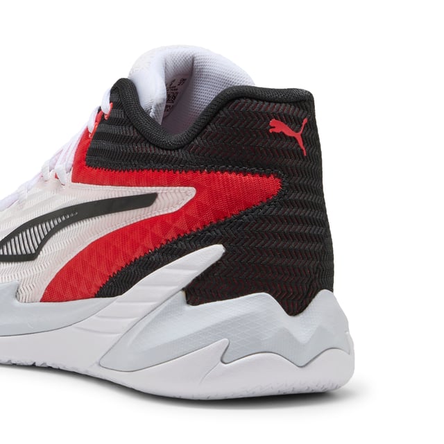 PRODUCT STORY: Stand out with fast, progressive design. Our latest innovation features a PROFOAM midsole for lightweight rebound, PUMA BITE outsole for traction, and dynamic lacing for a secure fit. Perfect for dominating outdoor courts with confidence and style. Get ready to win. FEATURES & BENEFITS: The upper of the shoes is made with at least 20% recycled materials; PUMA BITE: Durable outsole pattern that offers superior traction on the court; PROFOAM: Lightweight EVA designed to cushion your landing and propel your next step. DETAILS: Regular width; Dynamic lacing system with anchor points on the vamp and through the forefoot, for a more secure, sure-footed feel; External rubber wrap-up for lateral stability; PUMA Hoops Jaws branding; PUMA branding details.