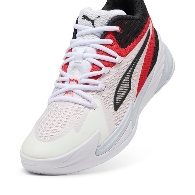 PRODUCT STORY: Stand out with fast, progressive design. Our latest innovation features a PROFOAM midsole for lightweight rebound, PUMA BITE outsole for traction, and dynamic lacing for a secure fit. Perfect for dominating outdoor courts with confidence and style. Get ready to win. FEATURES & BENEFITS: The upper of the shoes is made with at least 20% recycled materials; PUMA BITE: Durable outsole pattern that offers superior traction on the court; PROFOAM: Lightweight EVA designed to cushion your landing and propel your next step. DETAILS: Regular width; Dynamic lacing system with anchor points on the vamp and through the forefoot, for a more secure, sure-footed feel; External rubber wrap-up for lateral stability; PUMA Hoops Jaws branding; PUMA branding details.