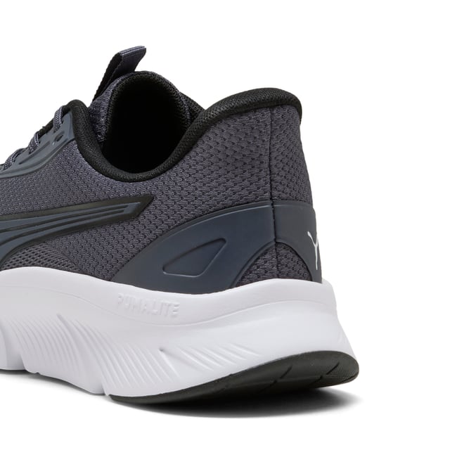PRODUCT STORY: The FlexFocus Lite Modern is the fastest new model in our PUMA Lite offering. This shoe features our PUMALITE foam technology that is built for lightweight comfort and also provides a sustainable benefit. The upper is highlighted with premium material. Head out for your run and bring it on home. FEATURES & BENEFITS: The upper of the shoes is made with at least 20% recycled materials; SOFTFOAM+: Step-in comfort sockliner designed to provide soft cushioning thanks to its extra thick heel. DETAILS: Lace closure; Progressive upper design; Zoned rubber outsole; Surface type: Road running; Recommended for: neutral pronators.