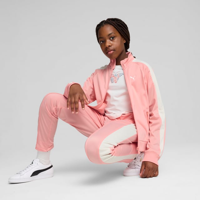 PRODUCT STORY: Step into the legacy of the T7 with this track jacket. Featuring our iconic panel inserts down the sides, a two-way zipper, and zippered side pockets, it's designed for those who embrace heritage with a modern twist. Feel the PUMA spirit in every stitch. DETAILS: Regular fit; Tricot; Standard jacket length; Stand up collar; Full zip; Long sleeves; Side Pocket; PUMA Youth: Recommended for older kids between 8 and 16 years.