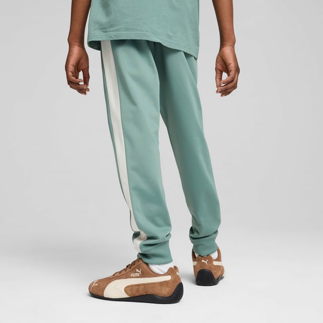 PRODUCT STORY: Step into the legacy with PUMA's track pants. Featuring T7 panel inserts, zip pockets, and an elasticated waistband with tonal drawcords, these pants combine heritage and modernity. The iconic CAT logo embroidery adds the finishing touch to your look. DETAILS: Regular fit; Tricot; Regular length; Medium rise; Side Pocket; PUMA Youth: Recommended for older kids between 8 and 16 years.