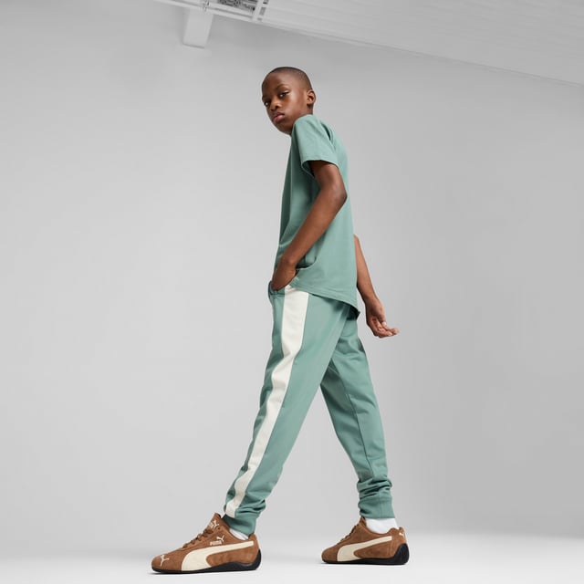 PRODUCT STORY: Step into the legacy with PUMA's track pants. Featuring T7 panel inserts, zip pockets, and an elasticated waistband with tonal drawcords, these pants combine heritage and modernity. The iconic CAT logo embroidery adds the finishing touch to your look. DETAILS: Regular fit; Tricot; Regular length; Medium rise; Side Pocket; PUMA Youth: Recommended for older kids between 8 and 16 years.