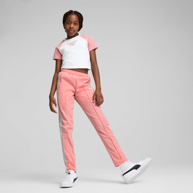 PRODUCT STORY: Step up your game with PUMA's slim track pants. Featuring T7 panel inserts, pintuck detailing, and zip pockets, these pants blend heritage and modernity. The elasticated waistband and tonal drawcords ensure a flawless fit, while the iconic logo adds a touch of legacy. DETAILS: Slim fit; Tricot; Regular length; Medium rise; Side Pocket; PUMA Youth: Recommended for older kids between 8 and 16 years.