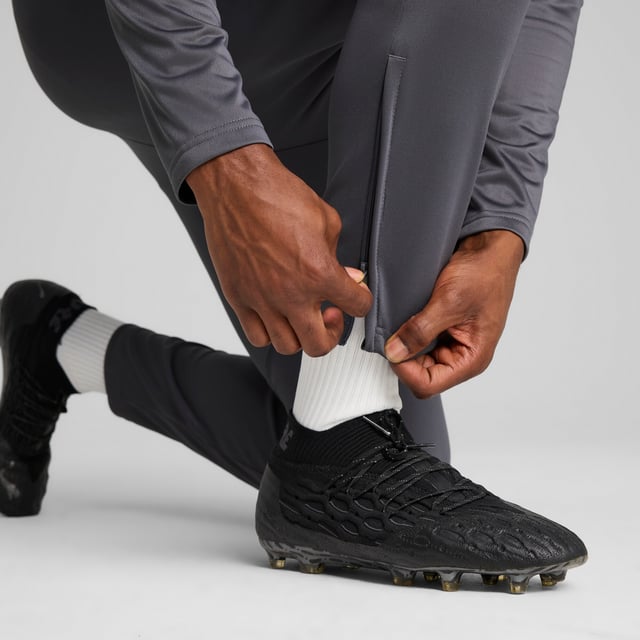 PRODUCT STORY: Your training sessions just got upgraded. These lightweight knitted pants are built for comfort and performance on the pitch with zip pockets, mesh contrasts and dryCELL technology to keep you dry. Now, get out there and show them what you've got. FEATURES & BENEFITS: Made with 100% recycled material excluding trims & decorations; dryCELL: Performance technology designed to wick moisture from the body and keep you free of sweat during exercise. DETAILS: Regular fit; 205 gsm, PiquÃ©; Medium rise; Zip pocket; PUMA branding details.