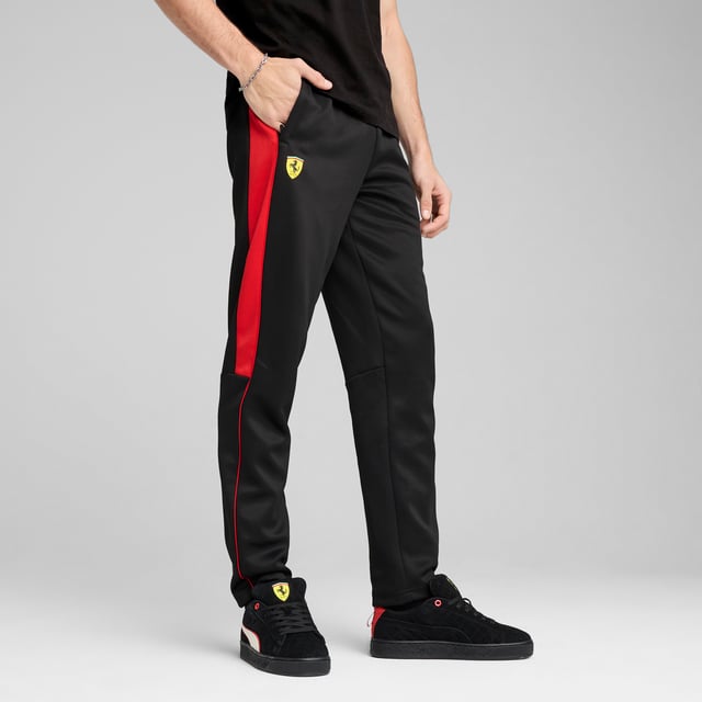 PRODUCT STORY: Rev up your style with PUMA and Scuderia Ferrari. These track pants feature colored side panels, piping details, and iconic logos. The elasticated waistband with internal drawcords ensures a perfect fit. Get ready to race through life with confidence and flair. FEATURES & BENEFITS: Made with at least 50% recycled materials. DETAILS: Regular fit; Spacer material; Regular length; Zip pocket; Medium rise; PUMA branding details.