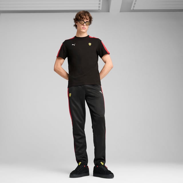 PRODUCT STORY: Rev up your style with PUMA and Scuderia Ferrari. These track pants feature colored side panels, piping details, and iconic logos. The elasticated waistband with internal drawcords ensures a perfect fit. Get ready to race through life with confidence and flair. FEATURES & BENEFITS: Made with at least 50% recycled materials. DETAILS: Regular fit; Spacer material; Regular length; Zip pocket; Medium rise; PUMA branding details.