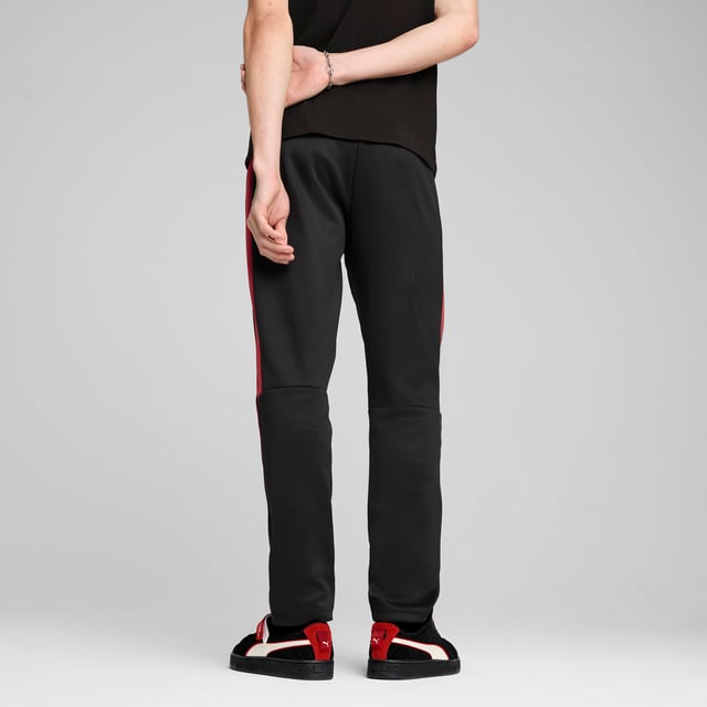 PRODUCT STORY: Rev up your style with PUMA and Scuderia Ferrari. These track pants feature colored side panels, piping details, and iconic logos. The elasticated waistband with internal drawcords ensures a perfect fit. Get ready to race through life with confidence and flair. FEATURES & BENEFITS: Made with at least 50% recycled materials. DETAILS: Regular fit; Spacer material; Regular length; Zip pocket; Medium rise; PUMA branding details.