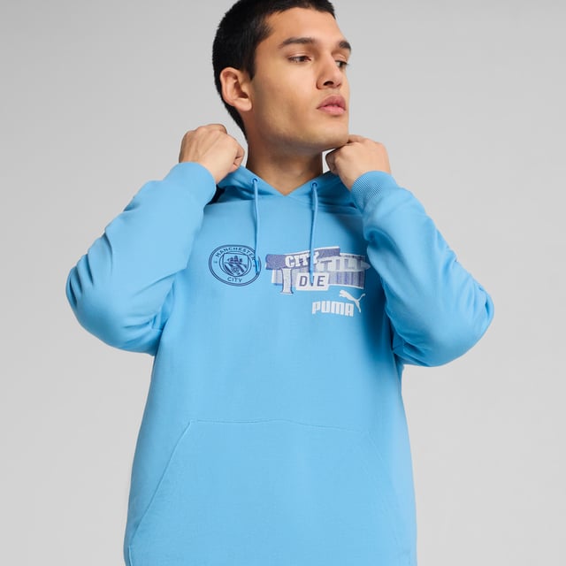 PRODUCT STORY: Dear Cityzens, show your pride with this PUMA hoodie. Featuring the iconic Man City badge and PUMA Cat Logo on the chest, elasticated waistband and cuffs, and crafted from soft French terry cotton. Perfect for repping your team at the Etihad Stadium. FEATURES & BENEFITS: Made with at least 20% recycled cotton. DETAILS: Regular fit; Baby terry material; Regular length; Hood; Kangaroo Pocket; Long sleeves; Manchester City crest and PUMA cat logo on the chest; Main Material 1: 78% cotton, 22% cotton Recycled - baby terry - 260.00 g/mÂ² - piece dyed - Chemical- Regular finishing.