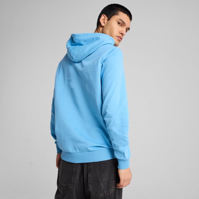 PRODUCT STORY: Dear Cityzens, show your pride with this PUMA hoodie. Featuring the iconic Man City badge and PUMA Cat Logo on the chest, elasticated waistband and cuffs, and crafted from soft French terry cotton. Perfect for repping your team at the Etihad Stadium. FEATURES & BENEFITS: Made with at least 20% recycled cotton. DETAILS: Regular fit; Baby terry material; Regular length; Hood; Kangaroo Pocket; Long sleeves; Manchester City crest and PUMA cat logo on the chest; Main Material 1: 78% cotton, 22% cotton Recycled - baby terry - 260.00 g/mÂ² - piece dyed - Chemical- Regular finishing.