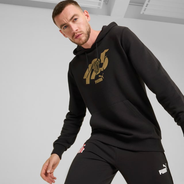 PUMA Mens AC Milan ftblCULTURE Hoodie PRODUCT STORY: Celebrate match day in Rossoneri style. This relaxed-fit hoodie lets you represent your club with pride, whether cheering from the stands or kicking back at home. The soft french terry fabric keeps you comfortable all day long. FEATURES & BENEFITS: Made with at least 20% recycled cotton. DETAILS: Regular fit; 280 gsm, knitted; Long sleeve; Elasticated waistband and cuffs; Official team branding.