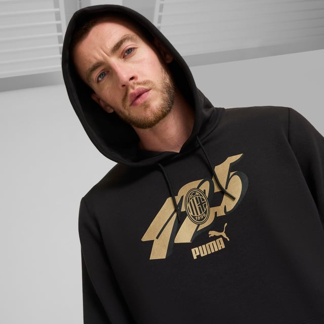 PUMA Mens AC Milan ftblCULTURE Hoodie PRODUCT STORY: Celebrate match day in Rossoneri style. This relaxed-fit hoodie lets you represent your club with pride, whether cheering from the stands or kicking back at home. The soft french terry fabric keeps you comfortable all day long. FEATURES & BENEFITS: Made with at least 20% recycled cotton. DETAILS: Regular fit; 280 gsm, knitted; Long sleeve; Elasticated waistband and cuffs; Official team branding.