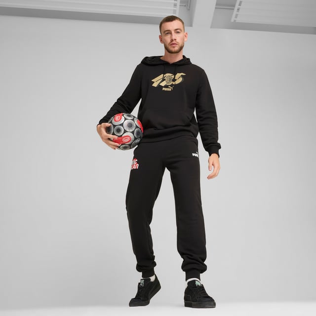 PUMA Mens AC Milan ftblCULTURE Hoodie PRODUCT STORY: Celebrate match day in Rossoneri style. This relaxed-fit hoodie lets you represent your club with pride, whether cheering from the stands or kicking back at home. The soft french terry fabric keeps you comfortable all day long. FEATURES & BENEFITS: Made with at least 20% recycled cotton. DETAILS: Regular fit; 280 gsm, knitted; Long sleeve; Elasticated waistband and cuffs; Official team branding.
