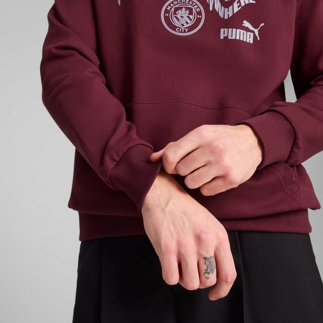 PRODUCT STORY: Dear Cityzens, show your pride with this PUMA hoodie. Featuring the iconic Man City badge and PUMA Cat Logo on the chest, elasticated waistband and cuffs, and crafted from soft French terry cotton. Perfect for repping your team at the Etihad Stadium. FEATURES & BENEFITS: Made with at least 20% recycled cotton. DETAILS: Regular fit; Baby terry material; Regular length; Hood; Kangaroo Pocket; Long sleeves; Manchester City crest and PUMA cat logo on the chest; Main Material 1: 78% cotton, 22% cotton Recycled - baby terry - 260.00 g/mÂ² - piece dyed - Chemical- Regular finishing.
