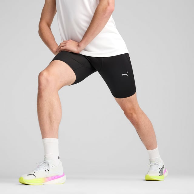 PRODUCT STORY: Unleash your run with these 8" short tights. Featuring ergonomic cutlines for ultimate freedom, dryCELL technology to keep you dry, and a tunneled drawcord for a perfect fit. Drop-in phone pockets ensure your essentials stay secure. Run free, run strong. FEATURES & BENEFITS: Made with at least 50% recycled materials; dryCELL: Performance technology designed to wick moisture from the body and keep you free of sweat during exercise. DETAILS: Tight fit; Interlock fabric; Above knee length; Medium rise; PUMA branding details.