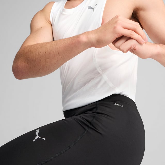 PRODUCT STORY: Unleash your run with these 8" short tights. Featuring ergonomic cutlines for ultimate freedom, dryCELL technology to keep you dry, and a tunneled drawcord for a perfect fit. Drop-in phone pockets ensure your essentials stay secure. Run free, run strong. FEATURES & BENEFITS: Made with at least 50% recycled materials; dryCELL: Performance technology designed to wick moisture from the body and keep you free of sweat during exercise. DETAILS: Tight fit; Interlock fabric; Above knee length; Medium rise; PUMA branding details.