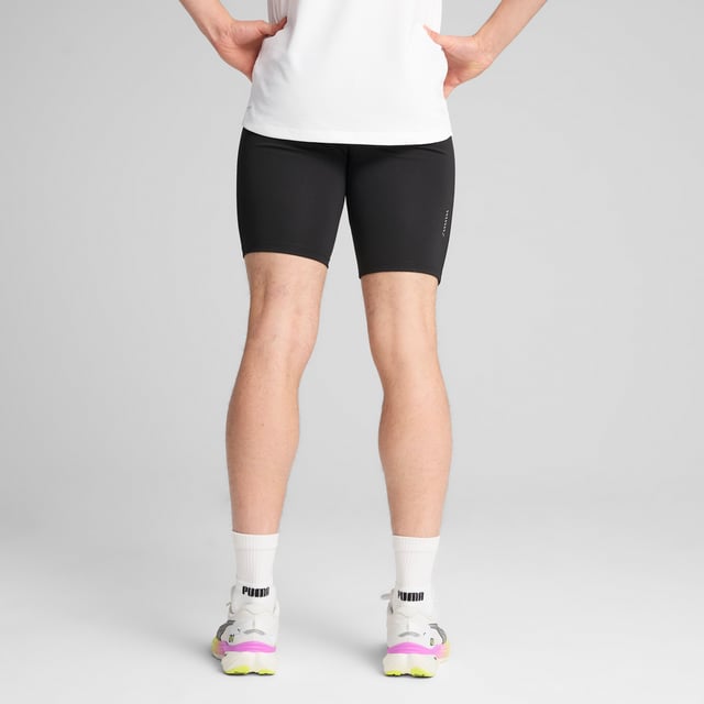 PRODUCT STORY: Unleash your run with these 8" short tights. Featuring ergonomic cutlines for ultimate freedom, dryCELL technology to keep you dry, and a tunneled drawcord for a perfect fit. Drop-in phone pockets ensure your essentials stay secure. Run free, run strong. FEATURES & BENEFITS: Made with at least 50% recycled materials; dryCELL: Performance technology designed to wick moisture from the body and keep you free of sweat during exercise. DETAILS: Tight fit; Interlock fabric; Above knee length; Medium rise; PUMA branding details.